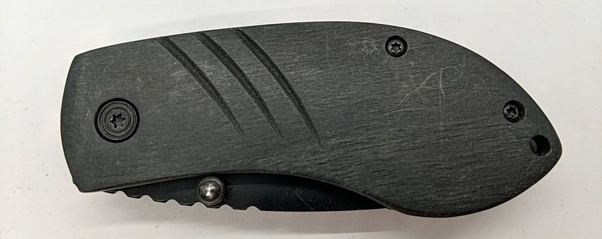 http://usedknives.com/cdn/shop/products/57_d21f32bb-3114-48bb-92ea-d484ed5fea70_1200x1200.png?v=1693544636