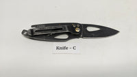 Coast Model FX200 Folding Pocket Knife Frame Lock All Black Bottle Opener Handle