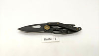 Coast Model FX200 Folding Pocket Knife Frame Lock All Black Bottle Opener Handle