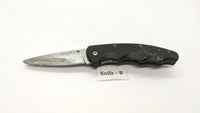 Coast LX311 Folding Pocket Knife Finger Grip Textured Nylon Plain Edge Liner Blk