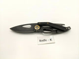 Coast Model FX200 Folding Pocket Knife Frame Lock All Black Bottle Opener Handle