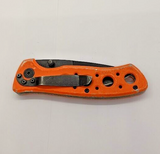 Magnum Drop Point Plain Edge Orange Handle Liner Lock Folding Pocket Knife