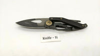 Coast Model FX200 Folding Pocket Knife Frame Lock All Black Bottle Opener Handle