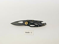 Coast Model FX200 Folding Pocket Knife Frame Lock All Black Bottle Opener Handle