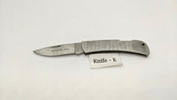 Winchester Stainless Steel Folding Pocket Knife Plain Edge Lockback Drop Point