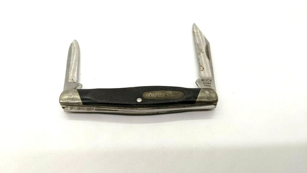 Buck USA 309 Dated 2010 Folding Pocket Knife 2 Blades Black Sawcut Delrin Handle