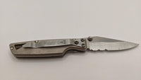 Buck Knife USA 2002 Partially Serrated Blade Clip Point Silver Pocket Knife